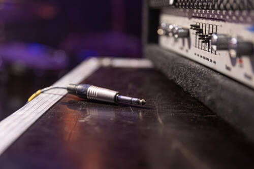 Jack audio connector being plugged into socket audio device music audio